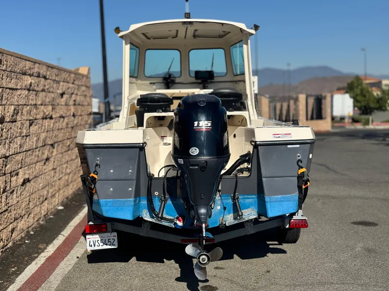 Slide: The Image of 2020 Arima Sea Chaser 19 Yellowtail Edition boat with 115 HP outboard motor. - 4