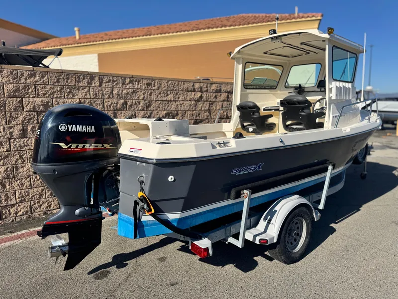 Slide: The Image of 2020 Arima Sea Chaser 19 Yellowtail Edition boat with Yamaha VMAX engine on trailer. - 5