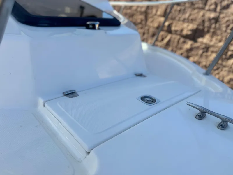 Slide: The Image of 2020 Arima Sea Chaser 19 Yellowtail Edition boat deck with hatch and cleat. - 8