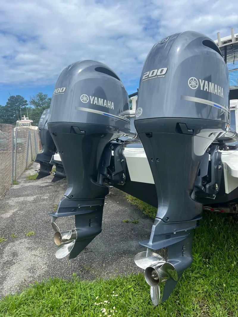 Slide: The Image of Twin Yamaha 200 outboard motors on a 2021 Parker 2510 XL Walkaround boat. - 7
