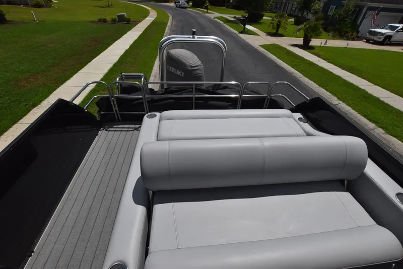 Slide: The Image of 2023 Bentley Pontoons 250 Elite Swingback Dual Captain, featuring sleek seating and modern design. - 11