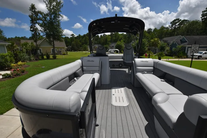 Slide: The Image of 2023 Bentley Pontoons 250 Elite Swingback Dual Captain interior with luxurious seating and modern design. - 4