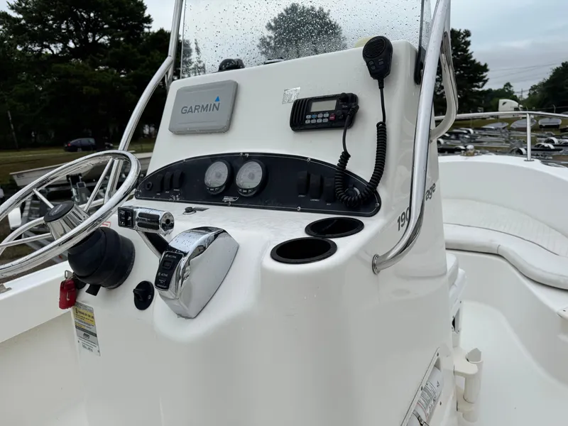 Slide: The Image of 2006 Boston Whaler 190 Outrage boat console with Garmin navigation and controls. - 11
