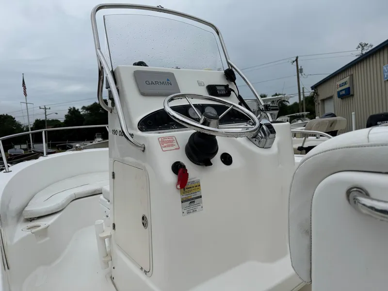 Slide: The Image of 2006 Boston Whaler 190 Outrage boat console with Garmin navigation system. - 12