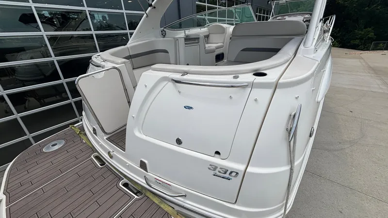 Slide: The Image of 2007 Chaparral Signature 330 boat with open deck and seating area. - 17