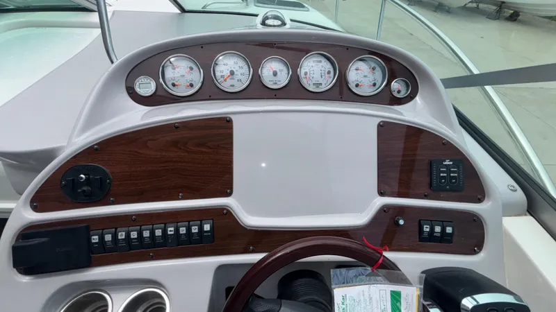 Slide: The Image of Dashboard of 2007 Chaparral Signature 330 boat with gauges and controls. - 45