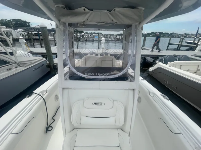 Slide: The Image of 2016 Sea Hunt Gamefish 27 boat docked at marina, interior view. - 20
