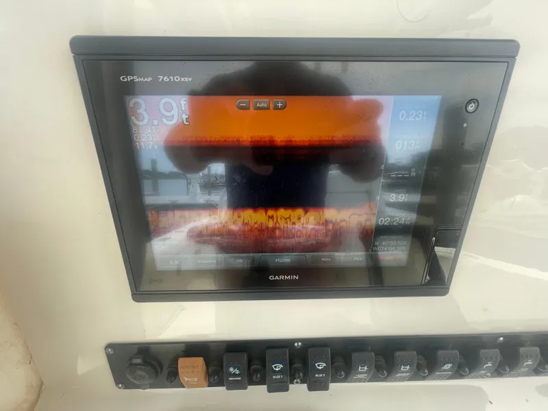 Slide: The Image of Garmin GPSMAP 7610xsv display on 2016 Sea Hunt Gamefish 27 boat dashboard. - 27