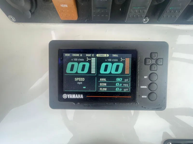 Slide: The Image of Yamaha display on 2016 Sea Hunt Gamefish 27 showing speed, fuel, and engine data. - 28