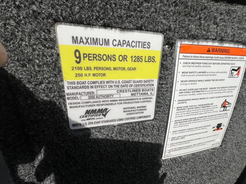 Slide: The Image of Maximum capacity label for 2025 Crestliner 2050 Authority boat, 9 persons or 1285 lbs. - 23