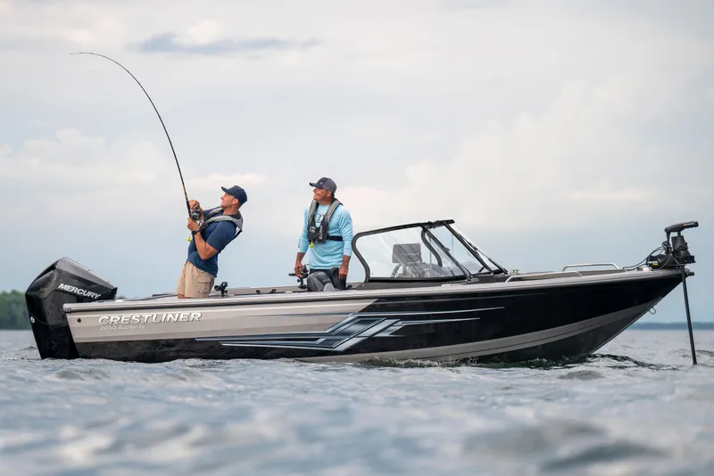 Slide: The Image of Manufacturer Provided Image: Two people fishing on a 2025 Crestliner 2050 Authority boat. - 24