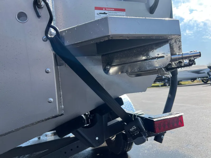 Slide: The Image of Rear view of 2025 Crestliner 2050 Authority boat with trailer attachment. - 6