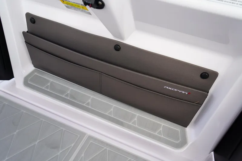 Slide: The Image of Storage compartment on 2022 Axopar 22 T-Top boat, featuring sleek design and practical functionality. - 20