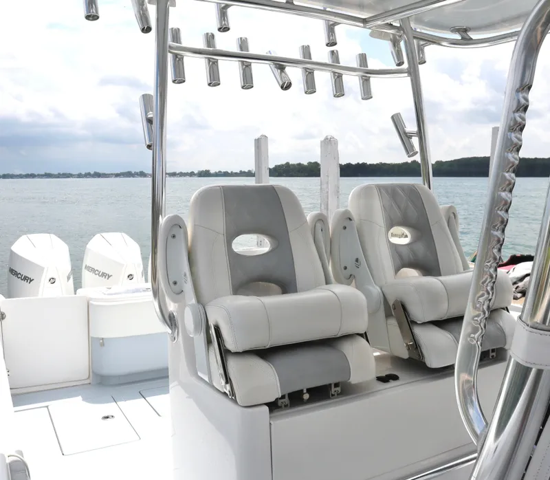 Slide: The Image of 2022 Contender 35 ST boat interior with dual seats and Mercury engines. - 9