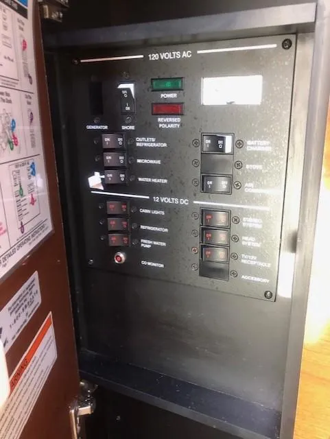 Slide: The Image of Electrical control panel on a 2008 Sea Ray 260 Sundancer boat. - 10