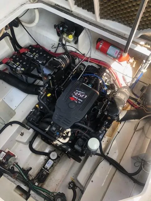 Slide: The Image of Engine compartment of a 2008 Sea Ray 260 Sundancer boat, featuring a MerCruiser 5.0 MPI engine. - 11