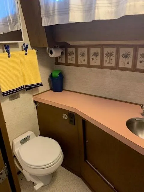 Slide: The Image of Bathroom interior of 1965 Chris-Craft 460 Constellation yacht with vintage decor. - 12