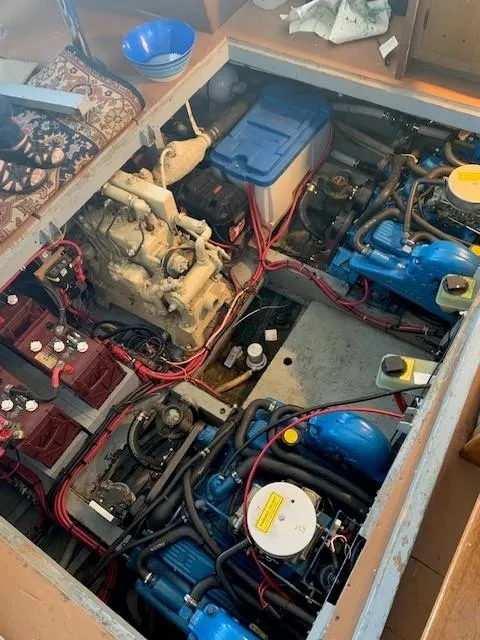 Slide: The Image of Engine room of 1965 Chris-Craft 460 Constellation with visible machinery and wiring. - 15