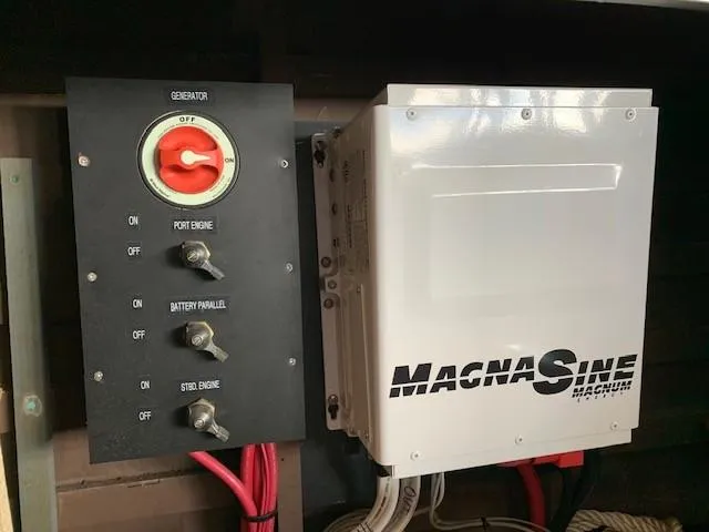 Slide: The Image of Control panel and MagnaSine inverter on a 1965 Chris-Craft 460 Constellation boat. - 19