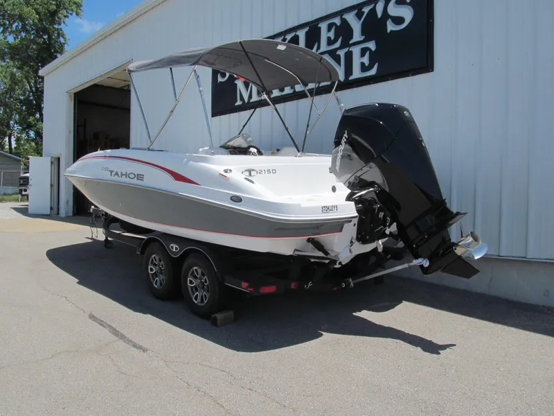 Slide: The Image of 2023 Tahoe 2150 boat on trailer outside Stokley's Marine. - 3