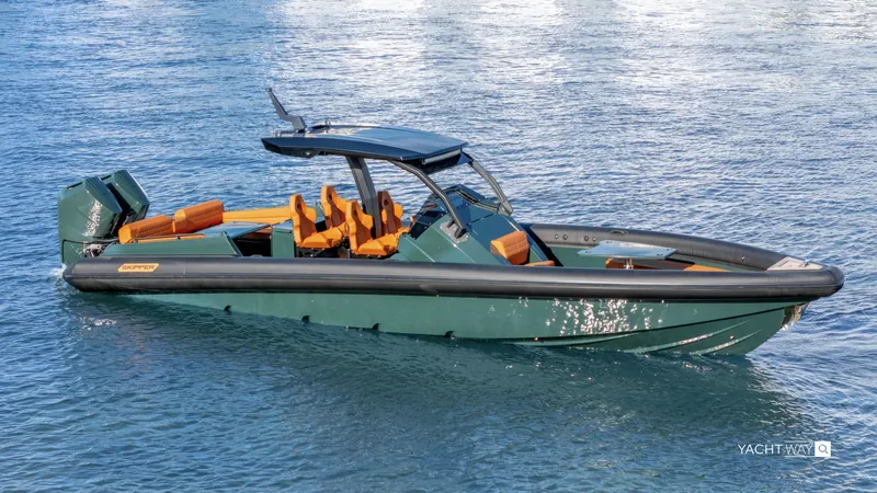 Slide: The Image of 2025 Skipper-BSK 38 boat on water, featuring sleek design and modern amenities. - 0