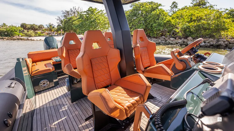 Slide: The Image of Luxurious 2025 Skipper-BSK 38 boat interior with orange leather seats and modern dashboard. - 47