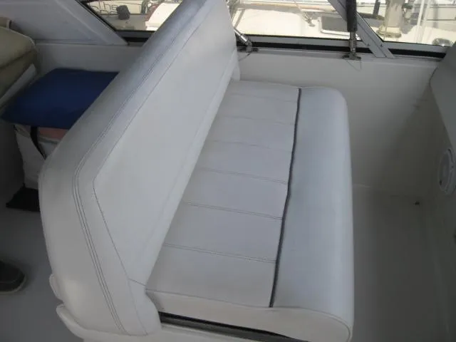 Slide: The Image of White seating on 1996 Carver 320 Voyager boat interior. - 6
