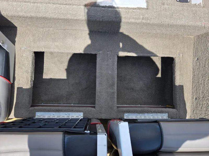 Slide: The Image of 2004 Tracker Pro Team 175 boat interior with storage compartments and shadow. - 20