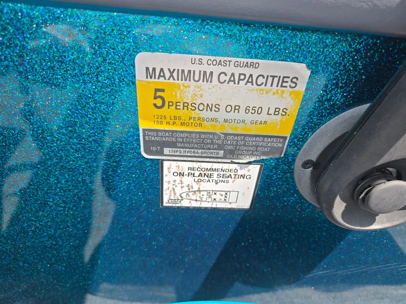 Slide: The Image of 1994 Hydra-Sports 175 FS boat capacity label, blue finish, 5 persons or 650 lbs limit. - 14