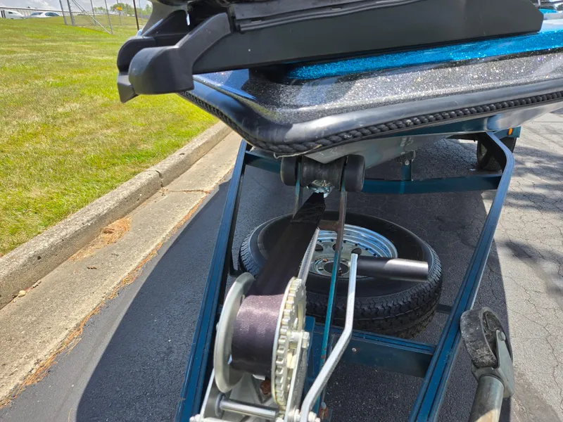 Slide: The Image of 1994 Hydra-Sports 175 FS boat on trailer, showing winch and spare tire. - 7