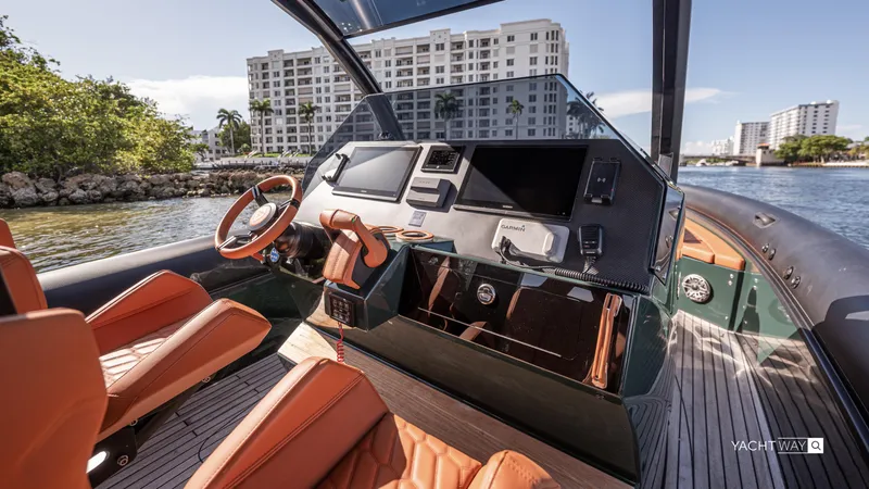 Slide: The Image of Luxurious 2025 Skipper-BSK 38 yacht interior with modern dashboard and leather seating. - 48