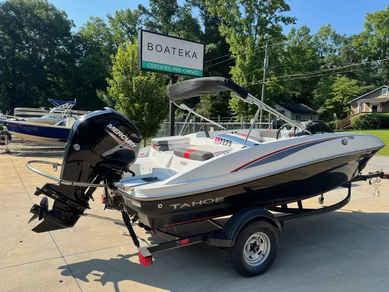 Slide: The Image of 2022 Tahoe T16 boat with Mercury engine at Boateka dealership. - 2