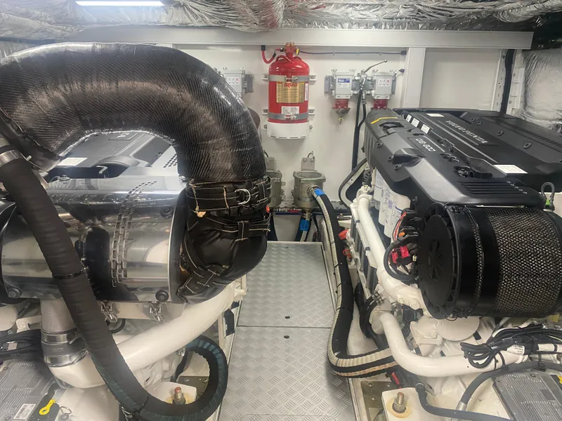 Slide: The Image of Engine room of 2022 Princess F55 yacht with advanced machinery and fire safety equipment. - 19