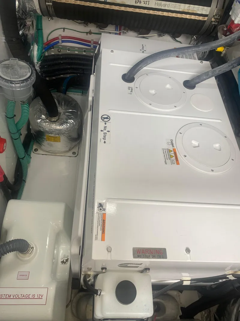 Slide: The Image of Engine room of 2022 Princess F55 yacht with electrical components and wiring. - 25