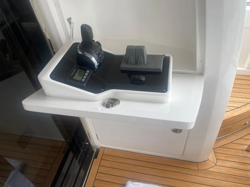 Slide: The Image of Control panel of 2022 Princess F55 yacht with joystick and display. - 26