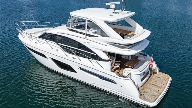 Slide: The Image of Luxurious 2022 Princess F55 yacht cruising on clear blue water. - 31