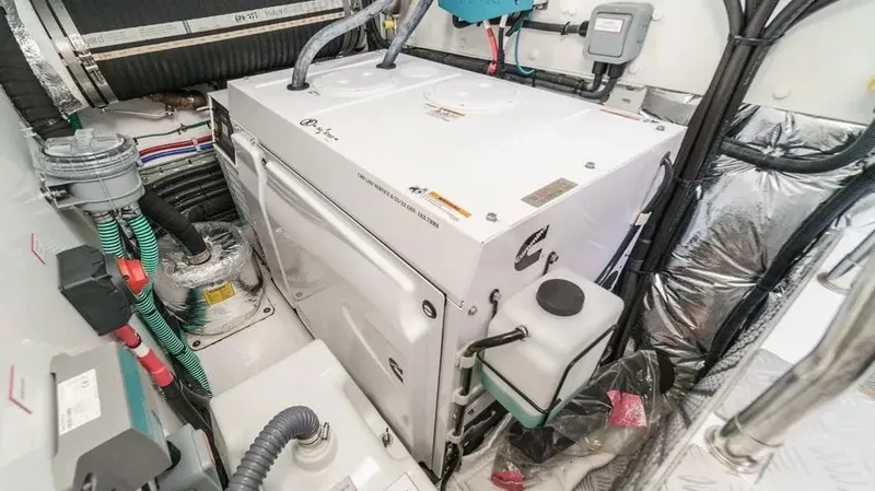 Slide: The Image of Engine room of 2022 Princess F55 yacht, featuring modern equipment and wiring. - 36