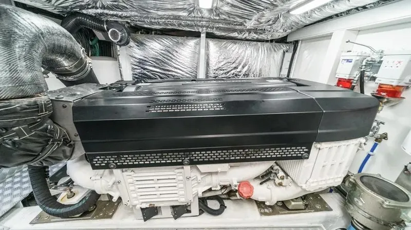 Slide: The Image of Engine room of 2022 Princess F55 yacht, featuring a modern engine setup. - 40