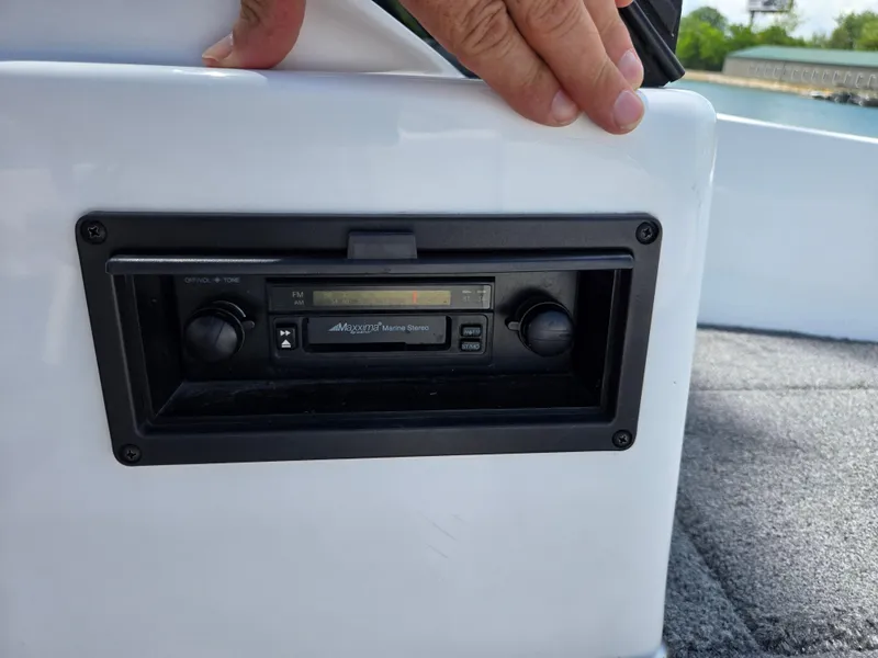 Slide: The Image of 1996 Javelin 360 FS boat with Maxxima marine stereo system installed. - 15