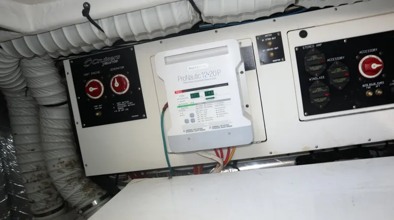 Slide: The Image of Electrical panel of a 2012 Cruisers Yachts 350 Express boat. - 34