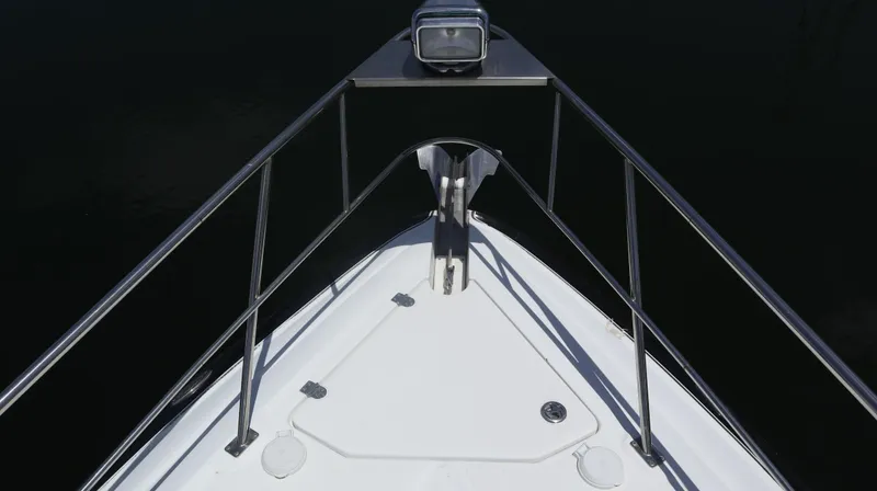 Slide: The Image of Bow view of 2012 Cruisers Yachts 350 Express with stainless steel railings. - 38