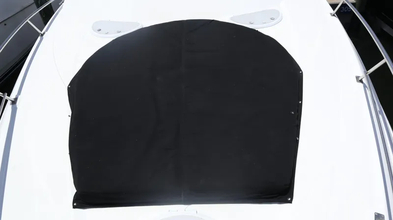 Slide: The Image of 2012 Cruisers Yachts 350 Express deck with black cover. - 43