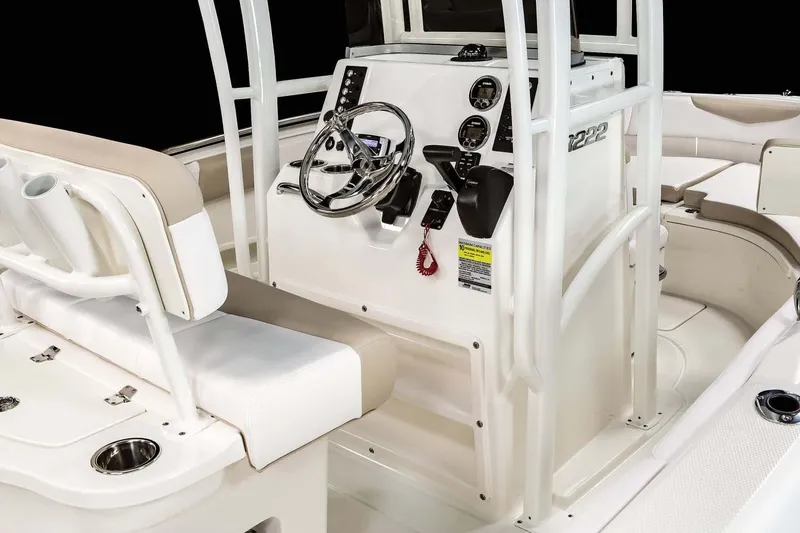 Slide: The Image of Manufacturer Provided Image: 2022 Robalo R222 Center Console boat interior with steering wheel and seating. - 10