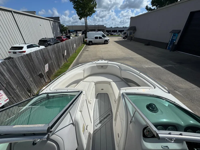 Slide: The Image of 2006 Chaparral 236 SSi boat interior with open bow seating and dashboard view. - 12