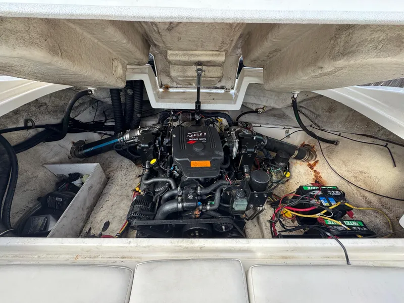 Slide: The Image of Engine compartment of a 2006 Chaparral 236 SSi boat, showing detailed mechanical components. - 17