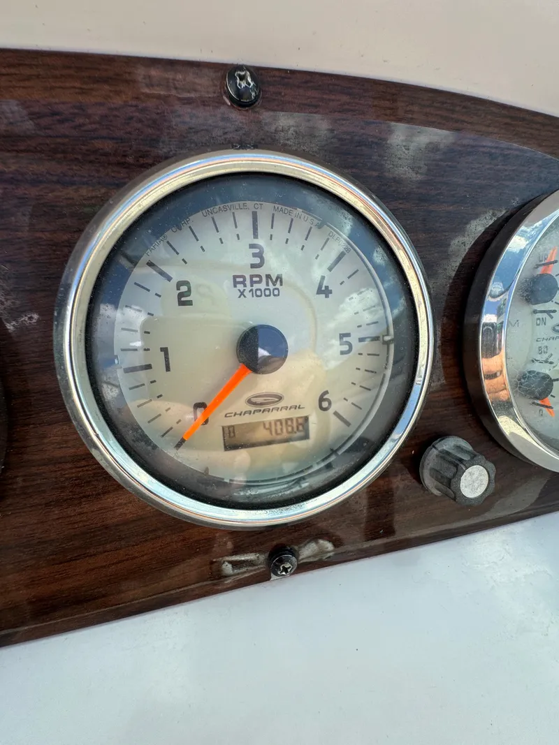Slide: The Image of Close-up of 2006 Chaparral 236 SSi RPM gauge on wooden dashboard. - 18