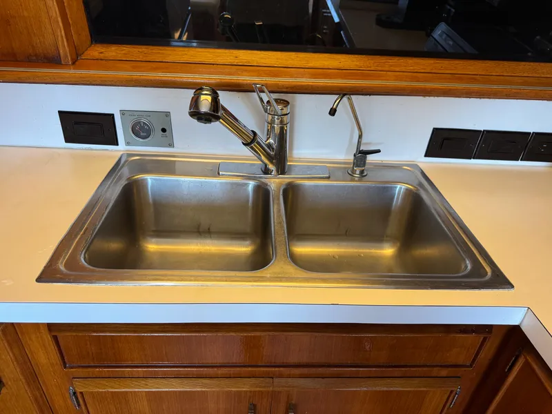 Slide: The Image of Stainless steel double sink in 1981 Bertram 58 Flybridge Motor Yacht kitchen. - 11