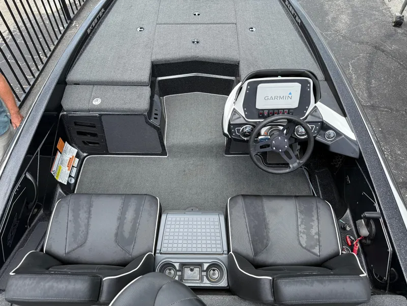 Slide: The Image of 2022 Skeeter ZX 150 boat interior with Garmin navigation system and dual seating. - 17