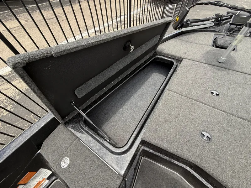 Slide: The Image of Open storage compartment on 2022 Skeeter ZX 150 boat, showcasing interior space. - 29