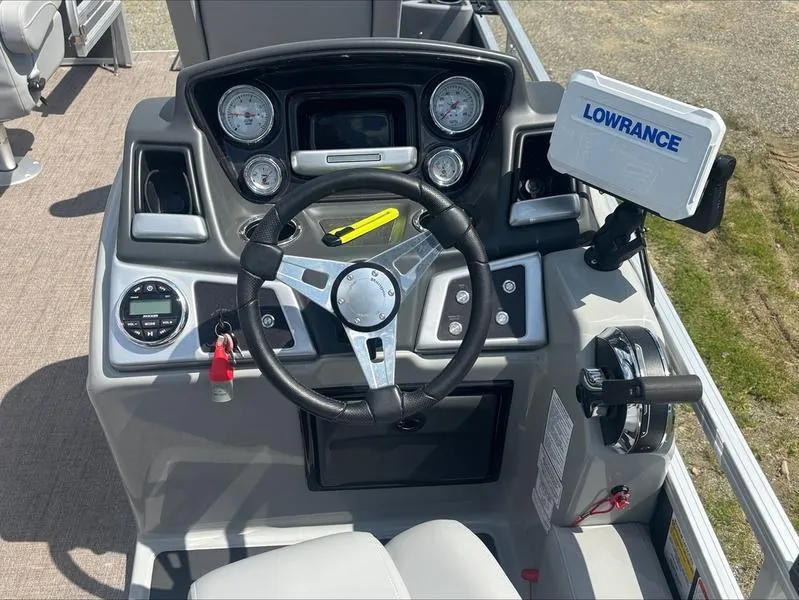 Slide: The Image of Steering console of 2022 Ranger 220 F boat with Lowrance navigation system. - 3